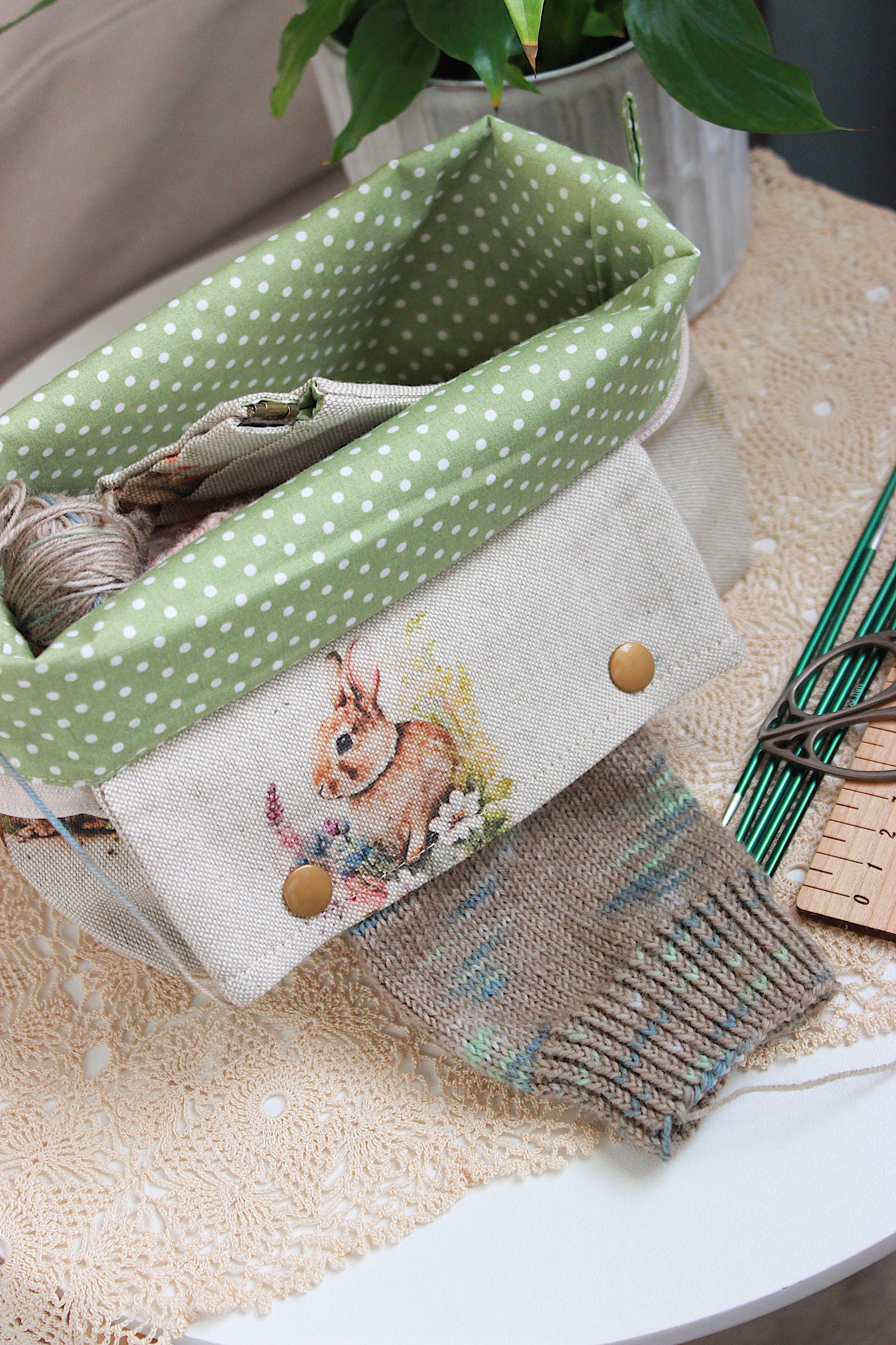 Knitting project bag with DPN holder Rabbits Canvas Fabric, featuring a rabbit and flower print, perfect for knitting on the go.