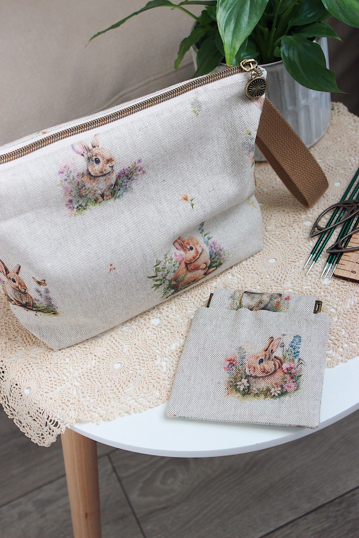 Knitting project bag with DPN holder Rabbits Canvas Fabric, featuring a rabbit and flower print, perfect for knitting on the go.