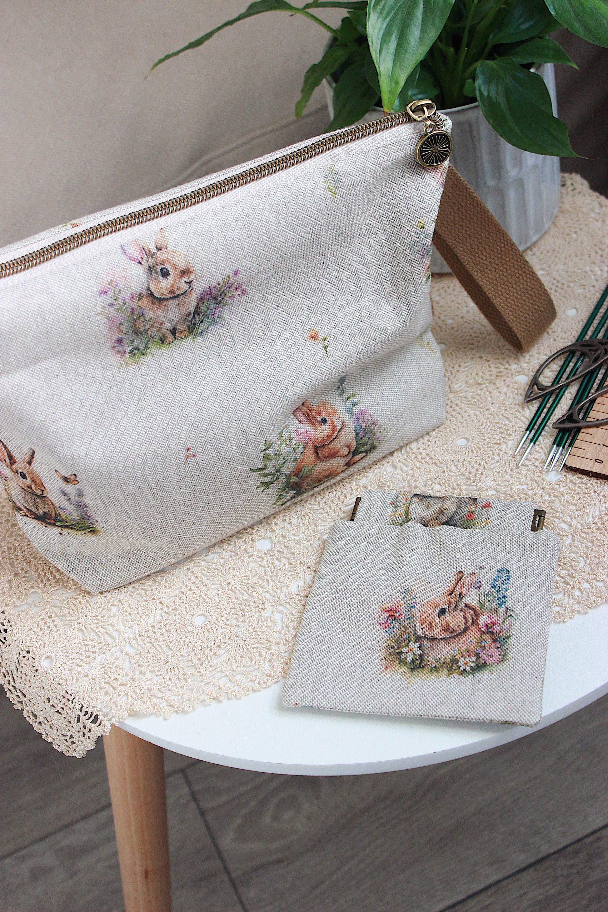 Knitting project bag with DPN holder Rabbits Canvas Fabric, featuring a rabbit and flower print, perfect for knitting on the go.