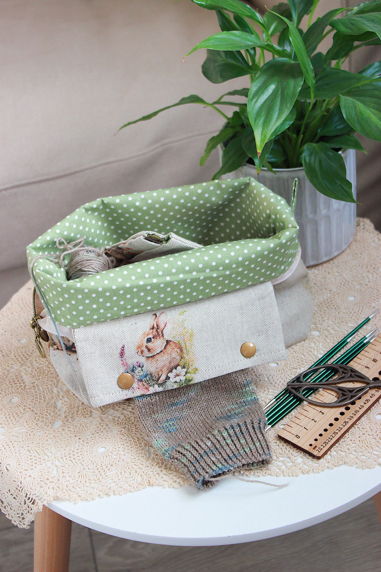 Knitting project bag with DPN holder Rabbits Canvas Fabric, featuring a rabbit and flower print, perfect for knitting on the go.