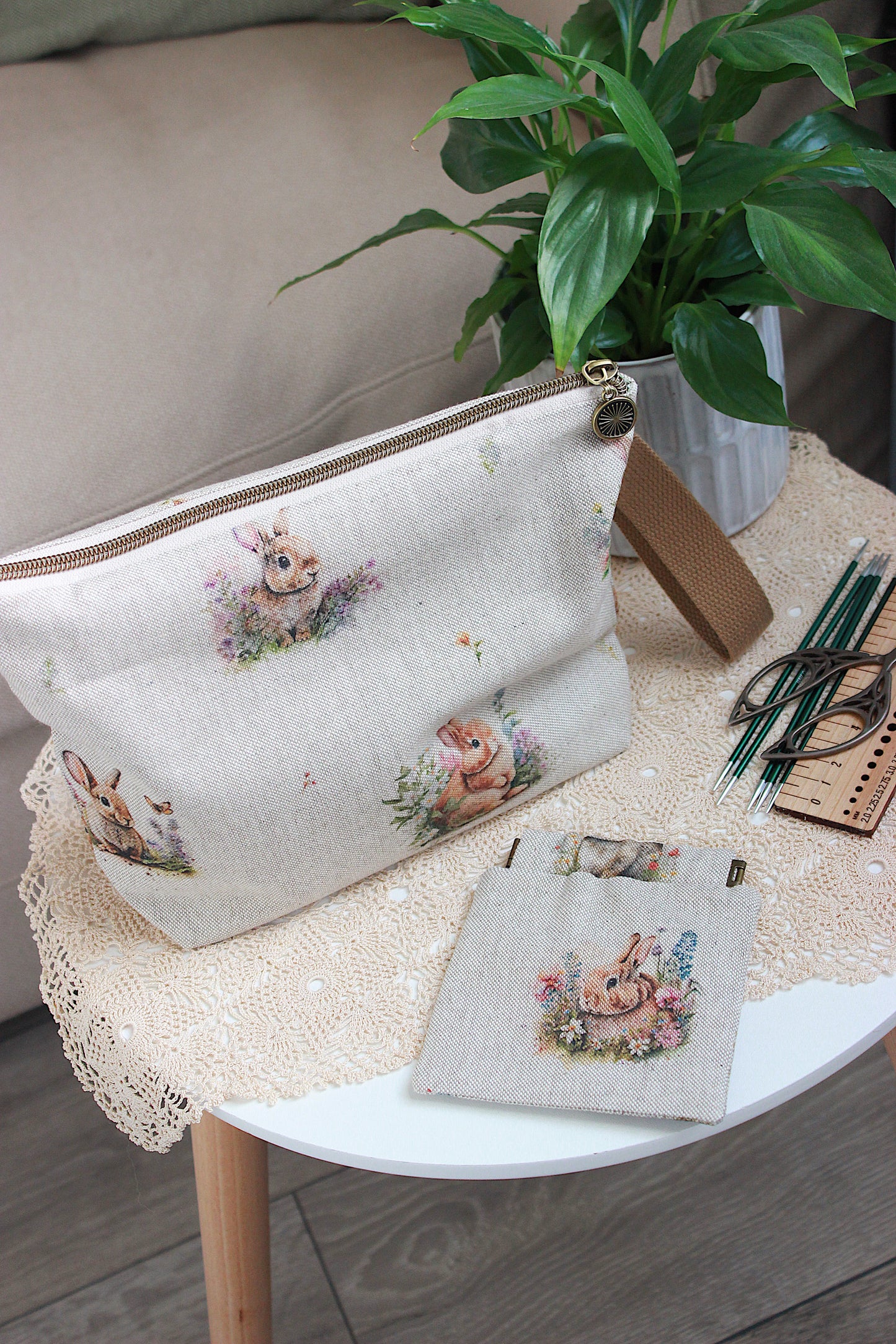 Knitting project bag with DPN holder Rabbits Canvas Fabric, featuring a rabbit and flower print, perfect for knitting on the go.