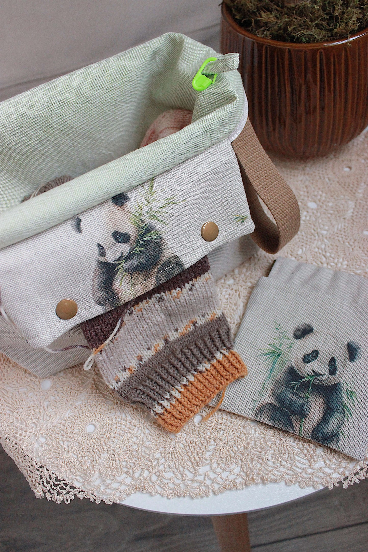 Knitting Project Bag with Built-in DPN Holder & Matching Squeeze Purse Baby Panda Print Printed Digital Canvas Fabric on a table. Knitting Project Bag with Built-in DPN Holder & Matching Squeeze Purse Baby Panda Print Printed Digital Canvas Fabric on a table.