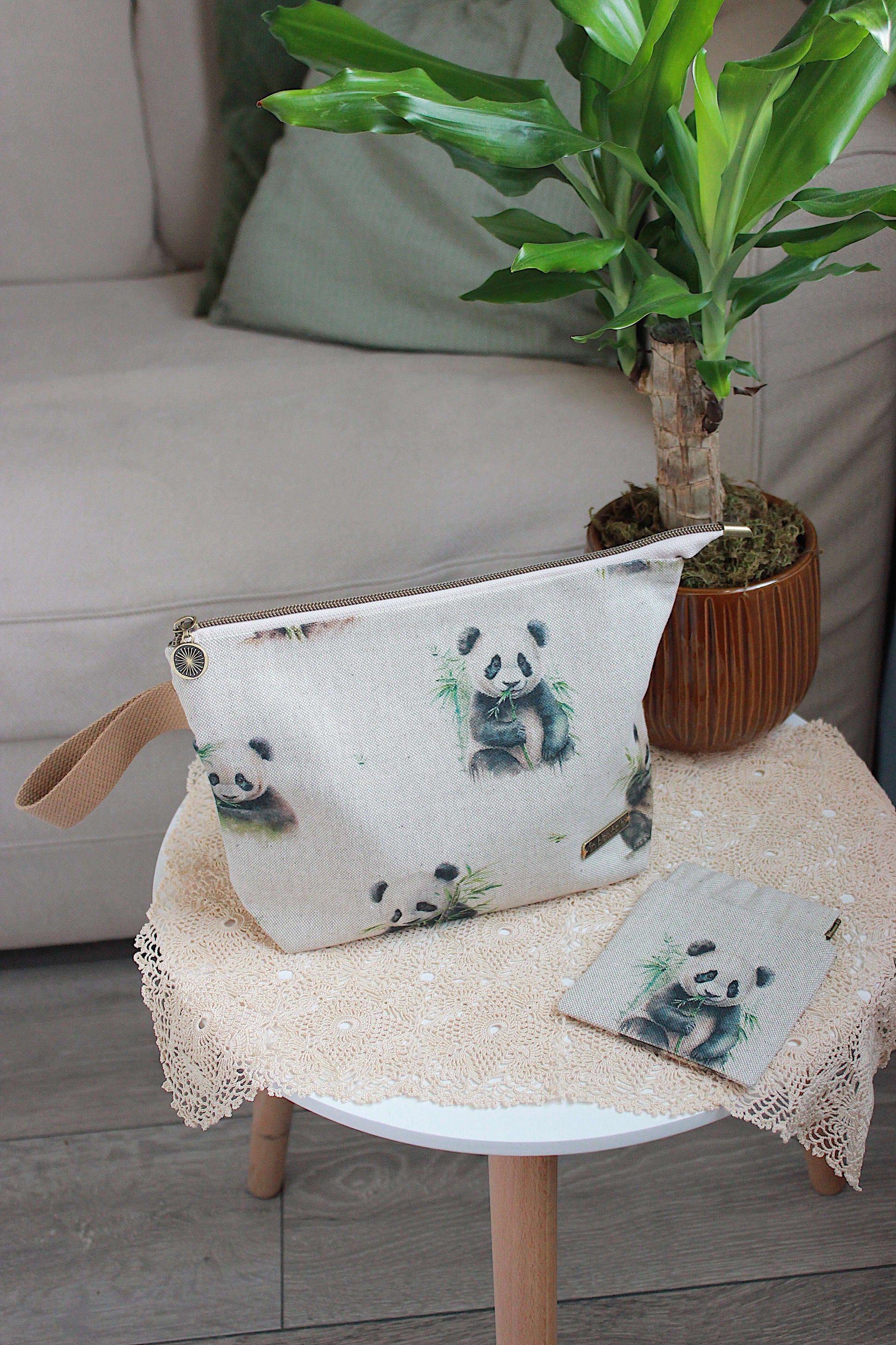 Knitting Project Bag with Built-in DPN Holder & Matching Squeeze Purse Baby Panda Print Printed Digital Canvas Fabric on a table. Knitting Project Bag with Built-in DPN Holder & Matching Squeeze Purse Baby Panda Print Printed Digital Canvas Fabric on a table.